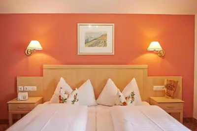 Ein Bett oder Betten in einem Zimmer der Unterkunft Hotel Steiger