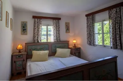 Ein Bett oder Betten in einem Zimmer der Unterkunft Mountain-view Cottage 15 beds-Pets welcome