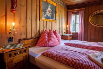 Ein Bett oder Betten in einem Zimmer der Unterkunft Mountain-view Cottage 15 beds-Pets welcome