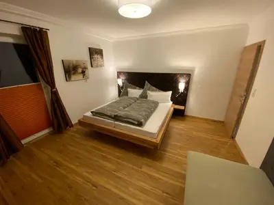 Ein Bett oder Betten in einem Zimmer der Unterkunft Ferienwohnung Wildkogelblick