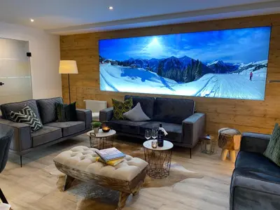 Ein Sitzbereich in der Unterkunft ALM SEASONS Premium Chalet & Studios