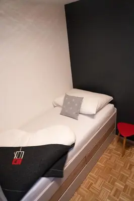 Ein Bett oder Betten in einem Zimmer der Unterkunft LUSE Living