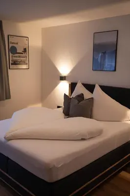Ein Bett oder Betten in einem Zimmer der Unterkunft LUSE Living