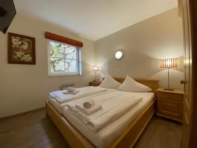 Ein Bett oder Betten in einem Zimmer der Unterkunft Genieten in Saalbach, Alpenresort Saalbach Top D1 by Droomvilla