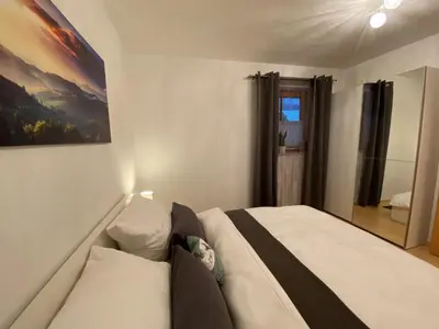 Ein Bett oder Betten in einem Zimmer der Unterkunft Ferienwohnung Tribus