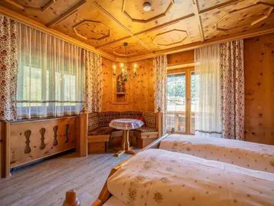 Ein Bett oder Betten in einem Zimmer der Unterkunft Tiroler Gästehaus