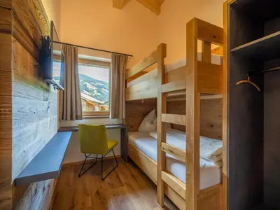 Ein Bett oder Betten in einem Zimmer der Unterkunft Chalet Bodahof