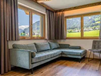 Ein Sitzbereich in der Unterkunft Chalet Bodahof
