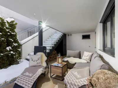 Ein Sitzbereich in der Unterkunft Van's Place, Luxury Apartment
