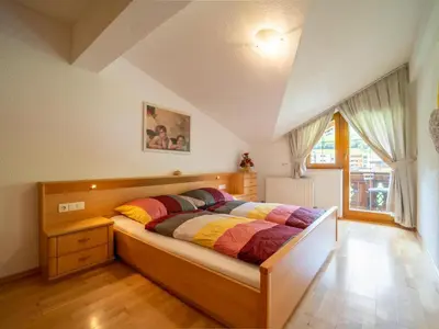 Ein Bett oder Betten in einem Zimmer der Unterkunft Apartment Aringer