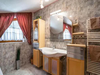 Ein Badezimmer in der Unterkunft Apartment Aringer