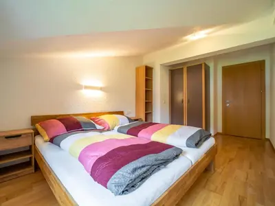 Ein Bett oder Betten in einem Zimmer der Unterkunft Apartment Aringer