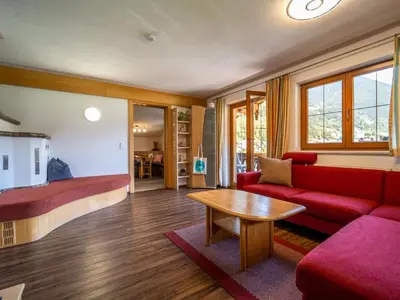 Ein Sitzbereich in der Unterkunft Apartment Aringer