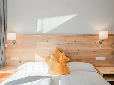 Ein Bett oder Betten in einem Zimmer der Unterkunft Tauern Juwel Top 8