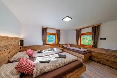Ein Bett oder Betten in einem Zimmer der Unterkunft Sonnentalhof