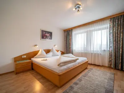 Ein Bett oder Betten in einem Zimmer der Unterkunft Apartment Rohrmoser