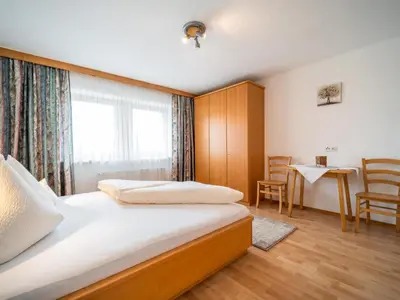 Ein Bett oder Betten in einem Zimmer der Unterkunft Apartment Rohrmoser