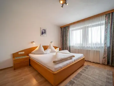 Ein Bett oder Betten in einem Zimmer der Unterkunft Apartment Rohrmoser