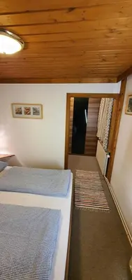 Ein Bett oder Betten in einem Zimmer der Unterkunft Henry‘s sweet home