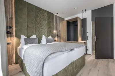 Ein Bett oder Betten in einem Zimmer der Unterkunft Perfect Lodgings Panorama