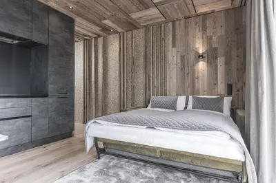 Ein Bett oder Betten in einem Zimmer der Unterkunft Perfect Lodgings Panorama Hart