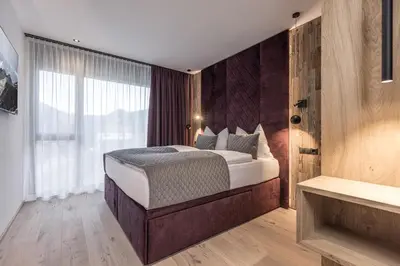 Ein Bett oder Betten in einem Zimmer der Unterkunft Perfect Lodgings Panorama Hart