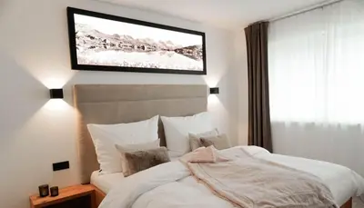 Ein Bett oder Betten in einem Zimmer der Unterkunft Wohlfühl Apart Andrea