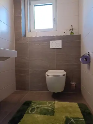 Ein Badezimmer in der Unterkunft Beim Orgeler