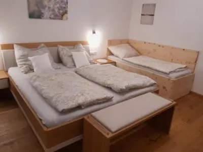 Ein Bett oder Betten in einem Zimmer der Unterkunft Beim Orgeler