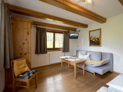 Ein Sitzbereich in der Unterkunft Ferienhaus & -wohnung Flatscher