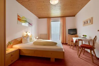 Ein Bett oder Betten in einem Zimmer der Unterkunft Landhaus Gredler