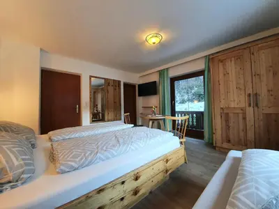 Ein Bett oder Betten in einem Zimmer der Unterkunft Ferienwohnung Kröll