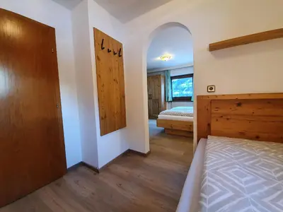 Ein Bett oder Betten in einem Zimmer der Unterkunft Ferienwohnung Kröll