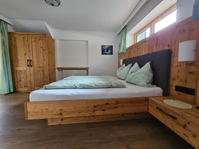 Ein Bett oder Betten in einem Zimmer der Unterkunft Ferienwohnung Kröll