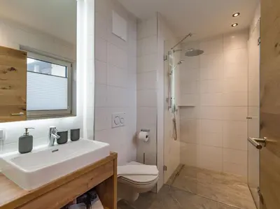 Ein Badezimmer in der Unterkunft Alps Holaus