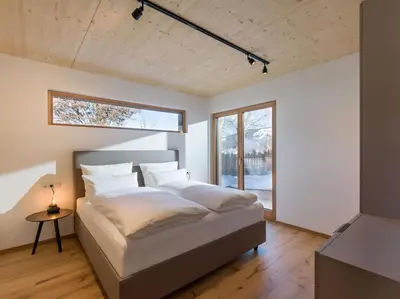Ein Bett oder Betten in einem Zimmer der Unterkunft Penning.Tirol