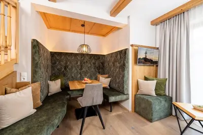 Ein Sitzbereich in der Unterkunft Ferienwohnungen Bäckenhaus
