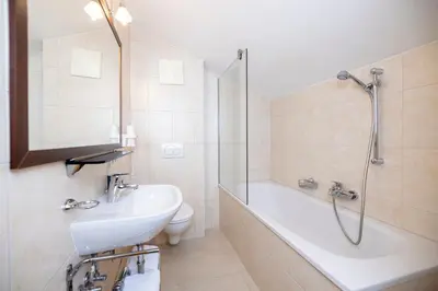 Ein Badezimmer in der Unterkunft Ferienwohnungen Bäckenhaus