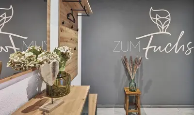 Ein Zertifikat, Auszeichnung, Logo oder anderes Dokument, das in der Unterkunft Apartment ZUM Fuchs ausgestellt ist