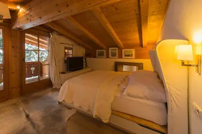 Ein Bett oder Betten in einem Zimmer der Unterkunft Das Kitz - deLuxe Chalet Valerie
