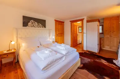 Ein Bett oder Betten in einem Zimmer der Unterkunft Das Kitz - deLuxe Chalet Valerie