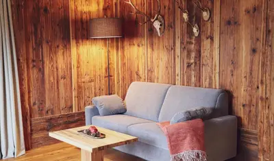 Ein Sitzbereich in der Unterkunft Mocking Ferienappartements