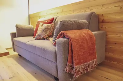 Ein Sitzbereich in der Unterkunft Mocking Ferienappartements