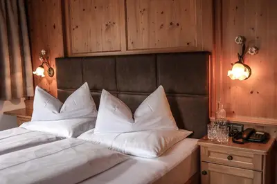 Ein Bett oder Betten in einem Zimmer der Unterkunft Metzgerwirt