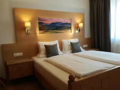 Ein Bett oder Betten in einem Zimmer der Unterkunft Ferienwohnung Aschaber