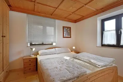 Ein Bett oder Betten in einem Zimmer der Unterkunft Haus Gerdi