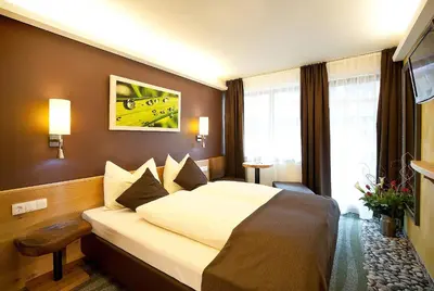 Ein Bett oder Betten in einem Zimmer der Unterkunft Lieblingsplatz Tirolerhof