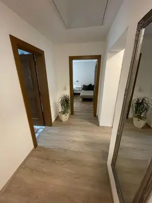 Ein Bett oder Betten in einem Zimmer der Unterkunft Apartment Wildalmblick