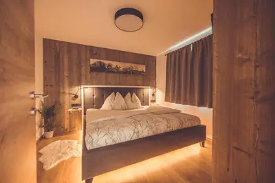 Ein Bett oder Betten in einem Zimmer der Unterkunft Apartment Gipfelblick