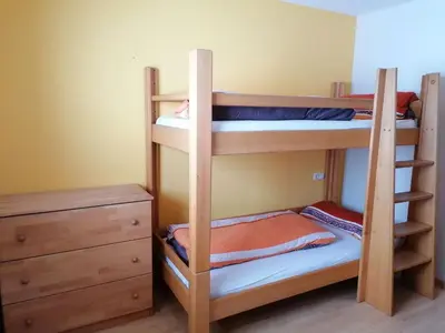 Ein Bett oder Betten in einem Zimmer der Unterkunft Holiday on an organic farm in Hart im Zillertal